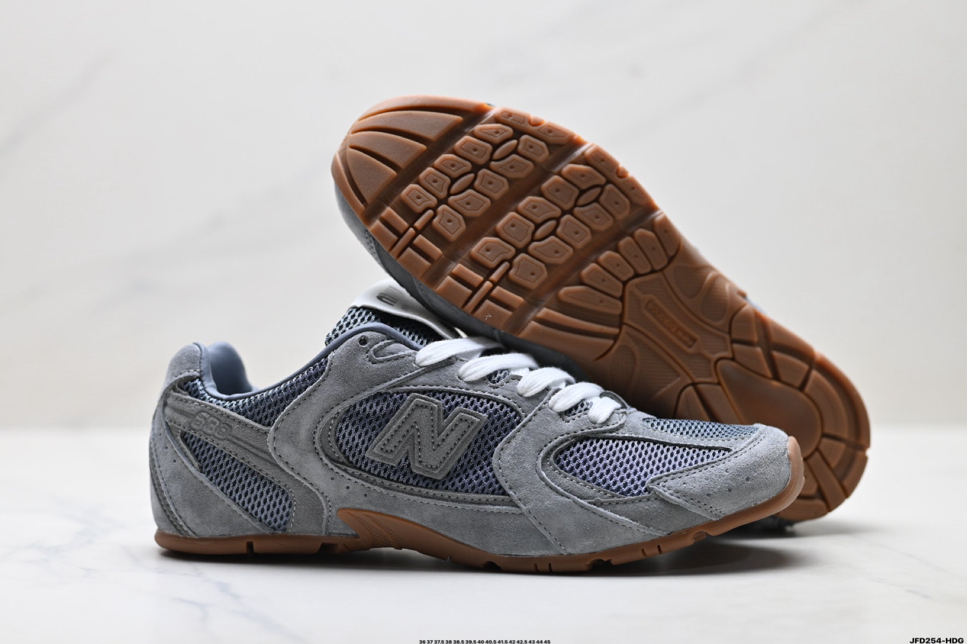 Miu Miu x New Balance 530 SL Retro Sneakers – Grey Gum