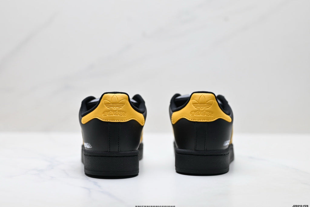 Adidas K81801450 Unisex Shell-Toe Sneakers - Black/Yellow - image 8