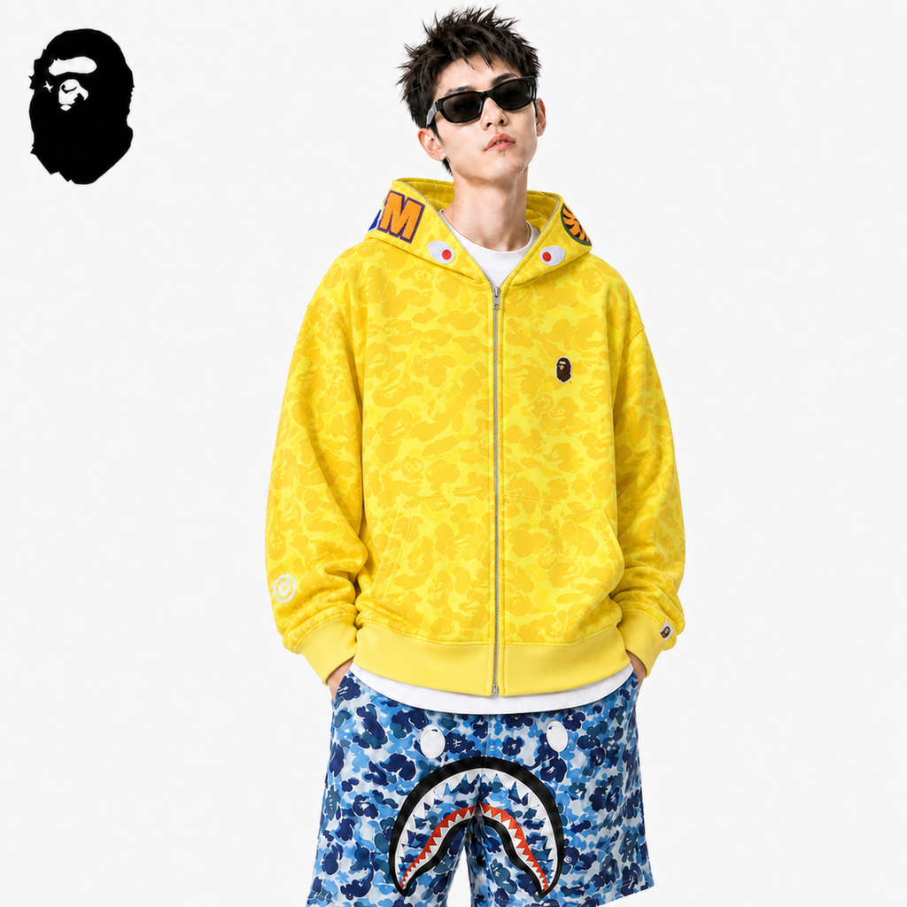 BAPE Yellow Camo Shark Zip Hoodie styled on a male model