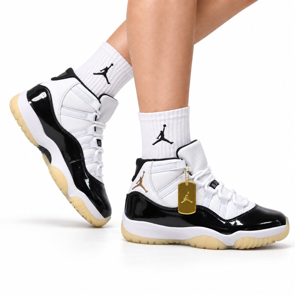 Air Jordan 11 Retro White Black Sail and Gold Unisex Sneakers Style 03 on-foot main image