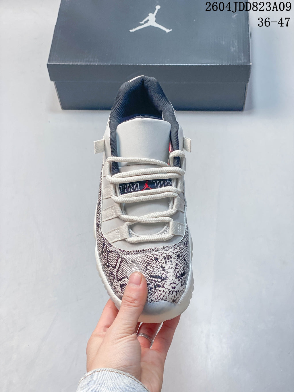 Air Jordan 11 Retro White Snakeskin Unisex Sneakers Style 04 detail view 1