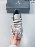 Air Jordan 11 Retro White Snakeskin Unisex Sneakers Style 04 detail view 1
