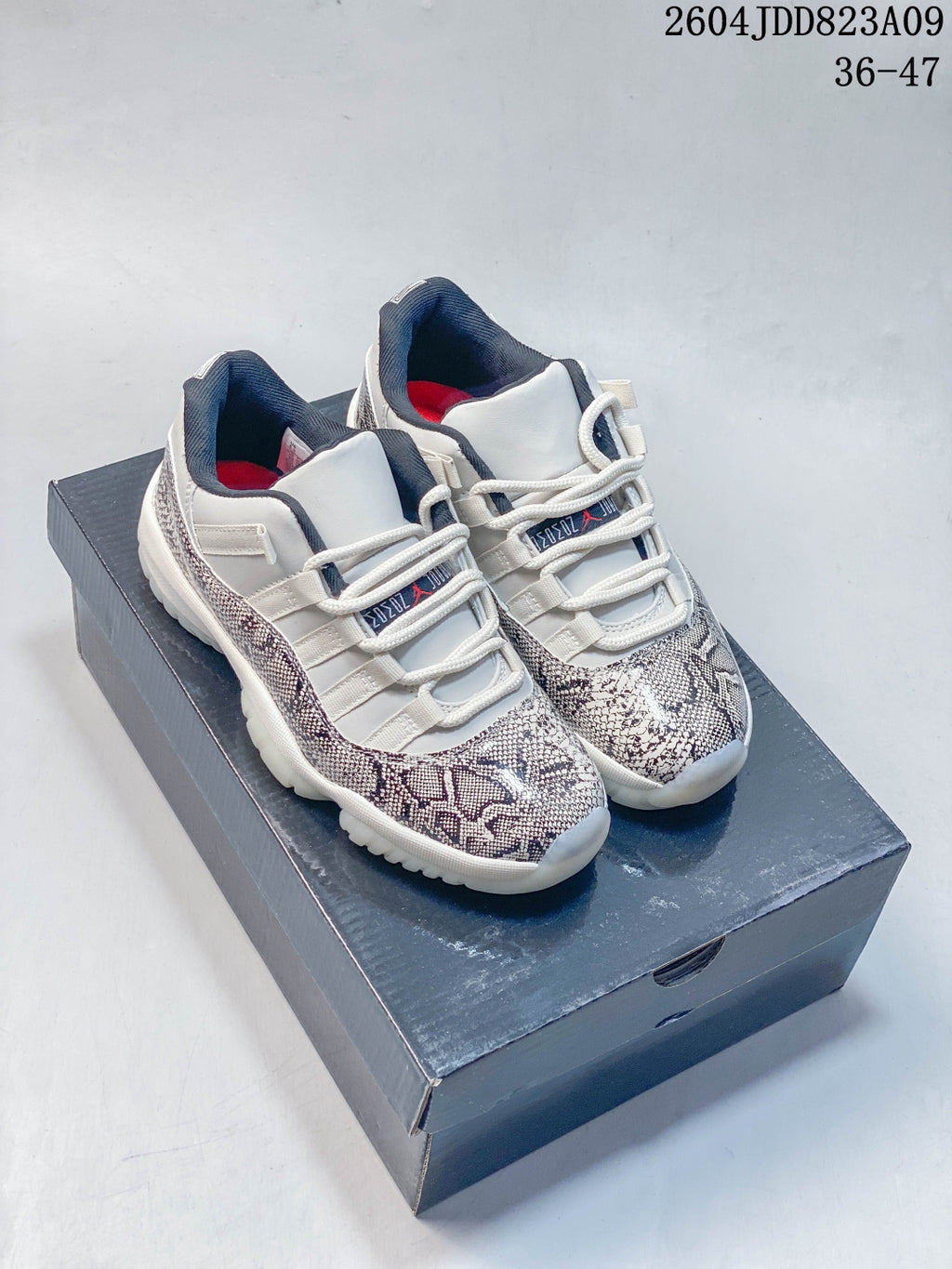 Air Jordan 11 Retro White Snakeskin Unisex Sneakers Style 04 detail view 5