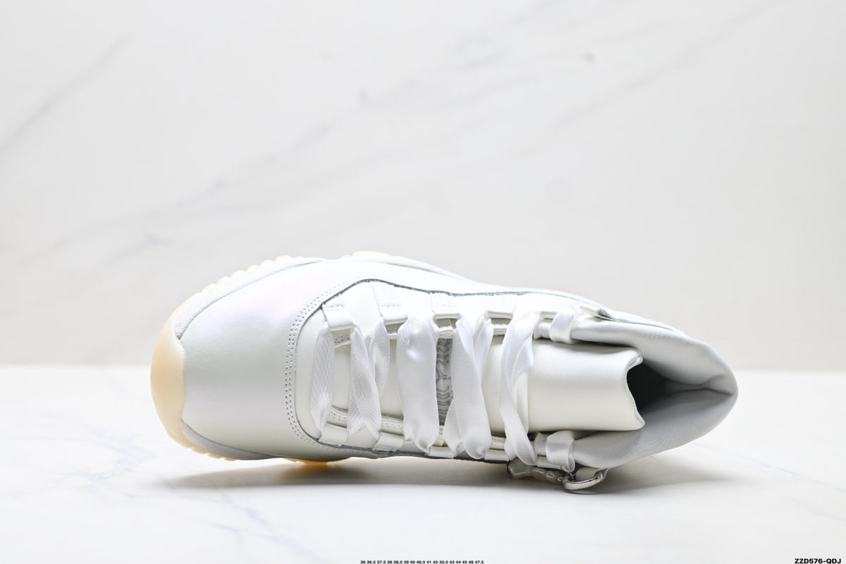 Air Jordan 11 Retro Triple White Unisex Sneakers Style 07 detail view 1
