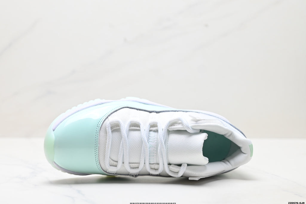 Air Jordan 11 Retro White and Mint Unisex Sneakers Style 09 detail view 1