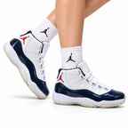 Air Jordan 11 Retro White and Midnight Navy Unisex Sneakers Style 11 on-foot main image