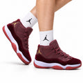 Air Jordan 11 Retro Burgundy and Gold Unisex Sneakers Style 14 on-foot main image