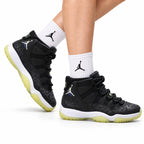 Air Jordan 11 Retro Black and Volt Unisex Sneakers Style 19 on-foot main image