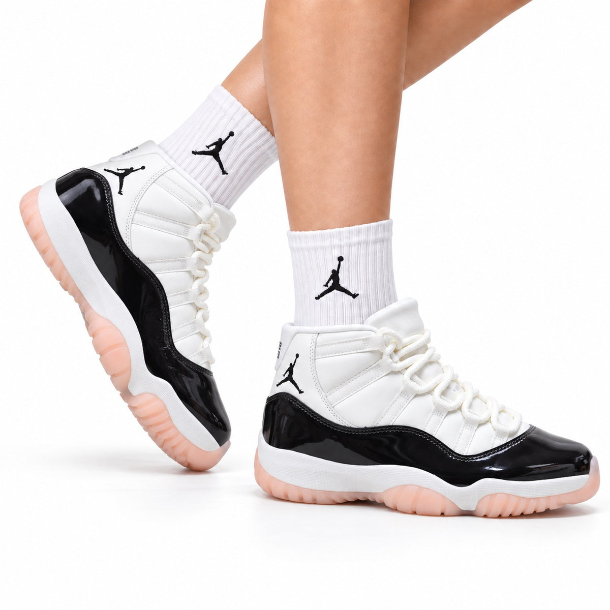 Air Jordan 11 Retro White Black and Pink Unisex Sneakers Style 21 on-foot main image