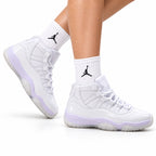 Air Jordan 11 Retro White and Lavender Unisex Sneakers Style 23 on-foot main image