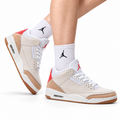 Air Jordan 3 Retro White Tan Gum sneakers on feet with Jordan socks