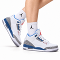 Air Jordan 3 Retro White Royal Blue Cement sneakers on feet with Jordan socks