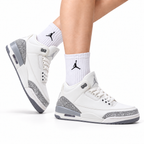 Air Jordan 3 Retro White Sail Cement sneakers on feet with Jordan socks