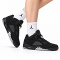 Air Jordan 5 Retro Black Metallic Silver Sneakers on-foot product image on a pure white background