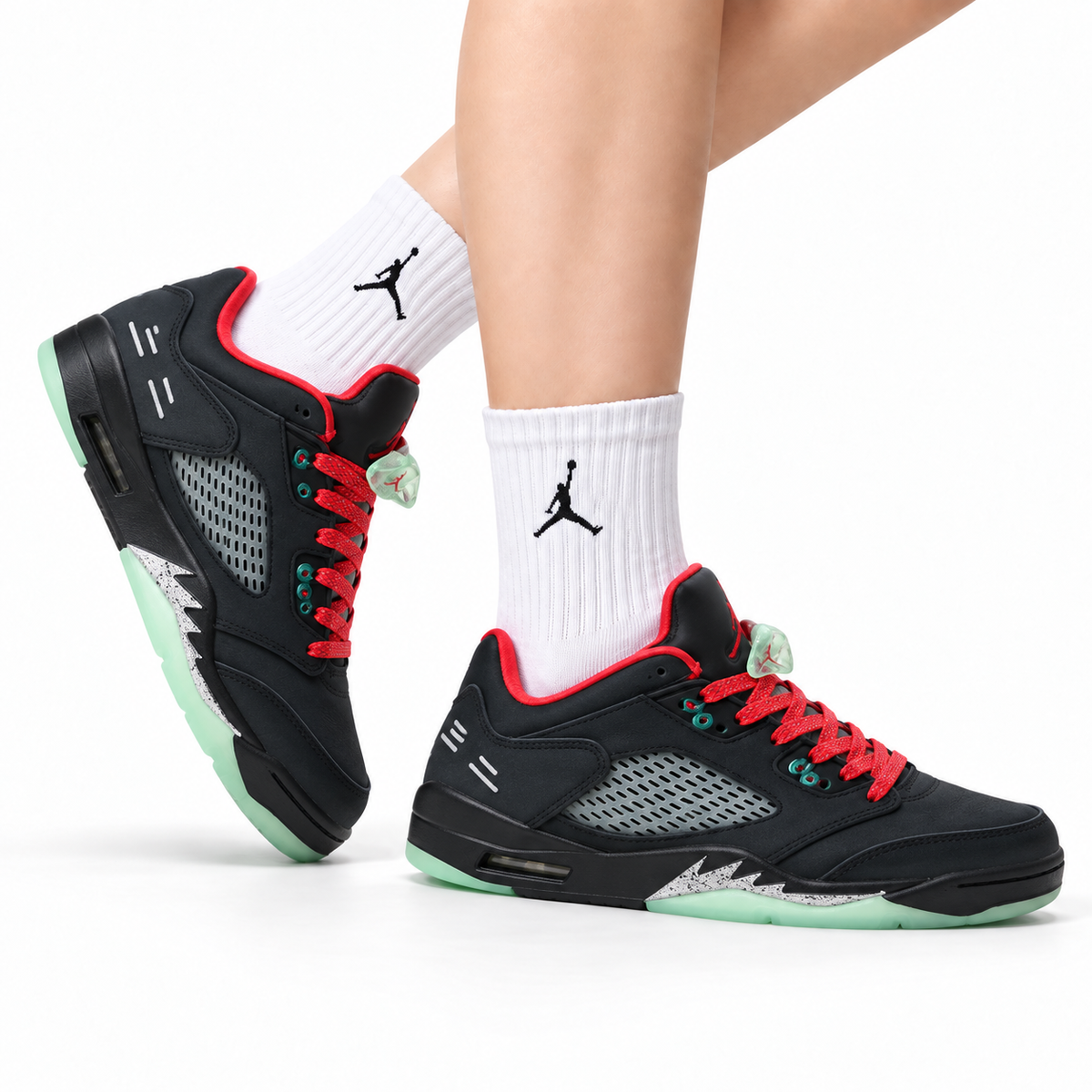 Air Jordan 5 Retro Black Red Green Glow Sneakers on-foot product image on a pure white background