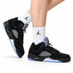 Air Jordan 5 Retro Black University Blue Sneakers on-foot product image on a pure white background