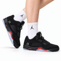 Air Jordan 5 Retro Black Fire Red Green Sneakers on-foot product image on a pure white background