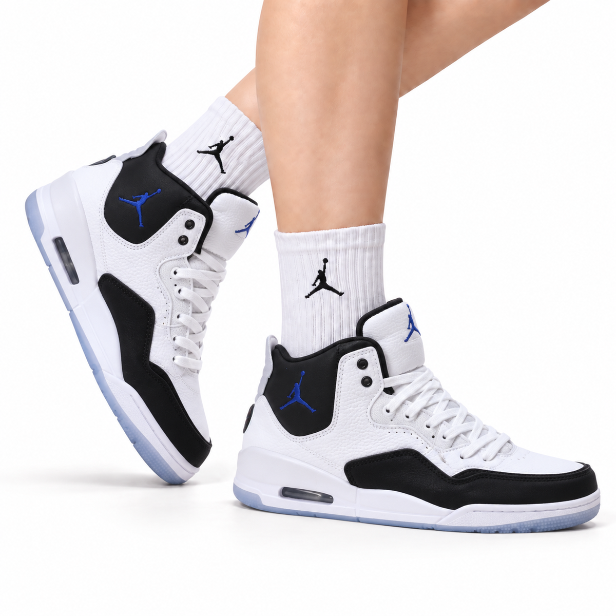 Jordan Legacy 312 High White Black Royal Blue sneakers on feet with Jordan socks