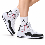 Jordan Legacy 312 High White Black Fire Red sneakers on feet with Jordan socks