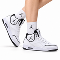 Jordan Legacy 312 High White Black sneakers on feet with Jordan socks