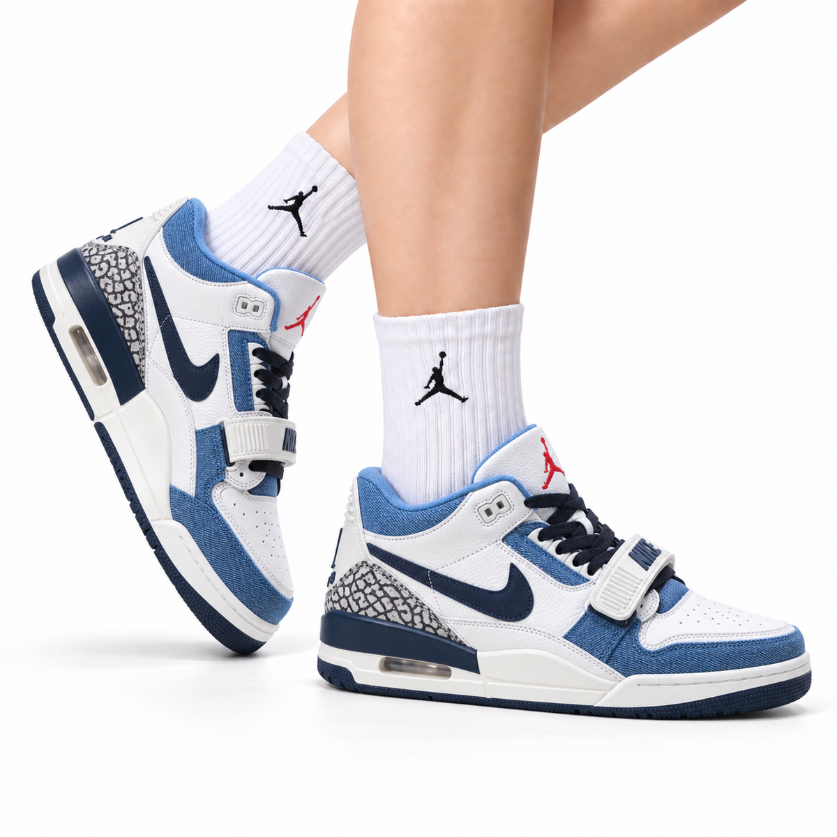 Jordan Legacy 312 Low White University Blue Navy sneakers on feet with Jordan socks