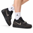 Jordan Legacy 312 Low Triple Black sneakers on feet with Jordan socks
