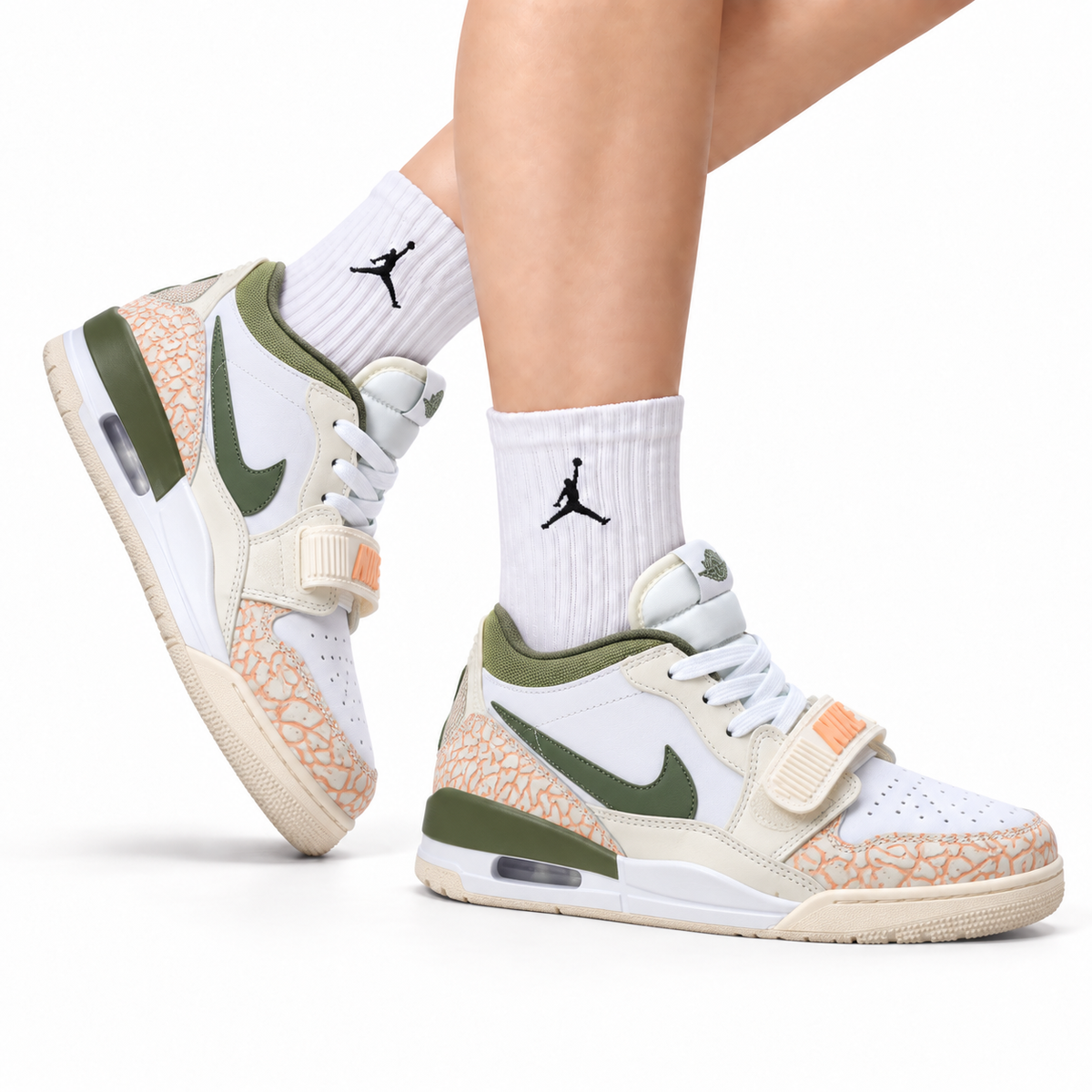 Jordan Legacy 312 Low White Sand Olive Green sneakers on feet with Jordan socks