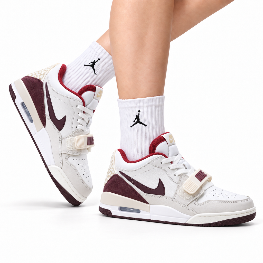 Jordan Legacy 312 Low White Burgundy Red sneakers on feet with Jordan socks