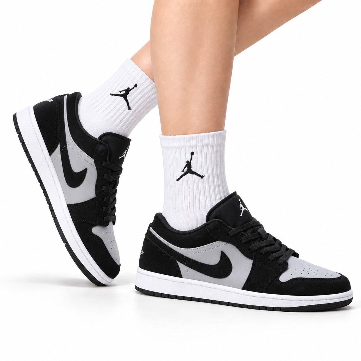 Nike Low-Top Sneakers Black White Unisex Style 32 white background lifestyle main view