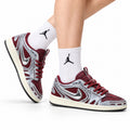 Nike Low-Top Sneakers Burgundy Silver Unisex Collaboration Edition Style 12 white background lifestyle main view